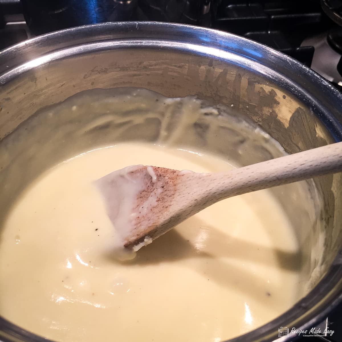 thickened white sauce in pan.