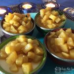 creamy coconut panna cotta topped with spiced pineapple.