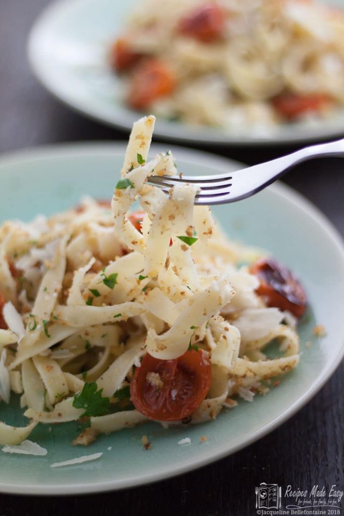 tagliatelle lifted up on fork.