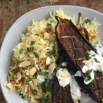 roast aubergine with saffron rice and yogurt dressing,