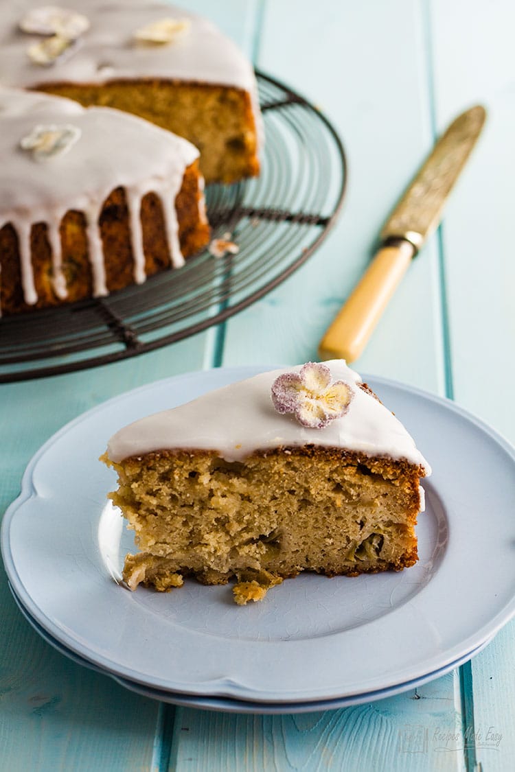 slice of rhubarb cake with elderflower drizzle icing