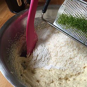 Folding in flour and zest.