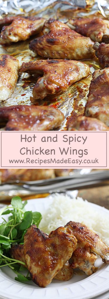 hot and spicy chicken wings on a baking sheet and served with rice