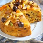 Special fruit and nut cake with slices out. Recipes made easy.