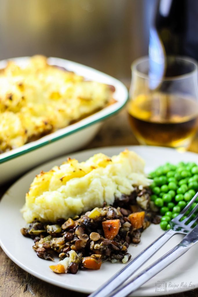 portion of vegetable and lentil bake on plate.