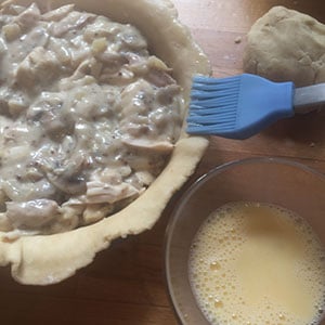 Line the base of the pie plate with pastry and pile in the filling. deep filled chicken and mushroom pie by recipesmadeeasy.co.uk