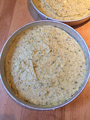 Divide between the cake tins and level the tops. Divide between the cake tins and level the tops.