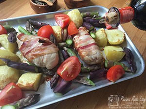 Season and drizzle with balsamic vinegar before returning to the oven. drizzling chicken and asparagus traybake with balsamic vinegar by recipes made easy