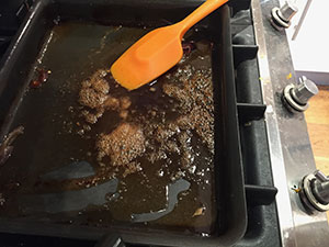 Sherry bubbling in pan.