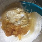 folding custard, ginger and syrup into cream