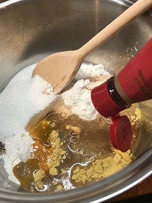 mixing dry igredients to a paste with a little vinegar.