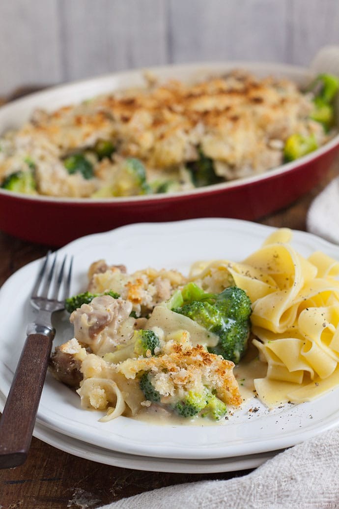 serving of chicken and broccoli au gratin on a plate with dish in background