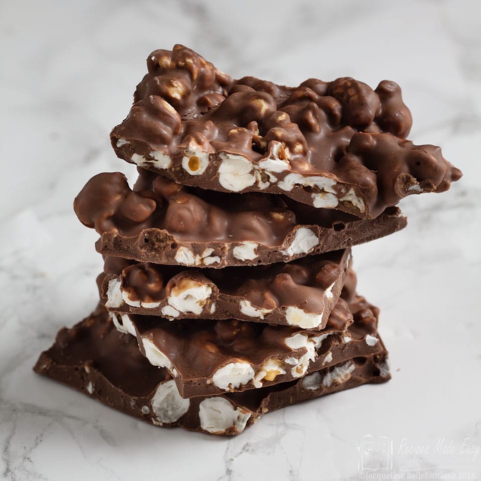 stack of pieces of chocolate with popcorn