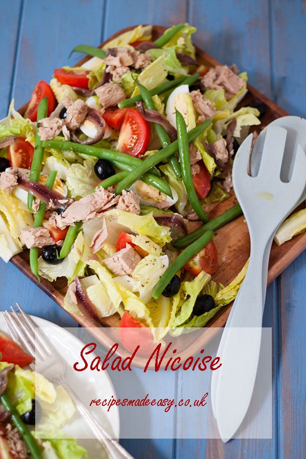platter fo salad nicoise with text overlay