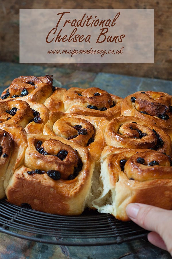 buns on a rack with one being removed