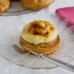 puits d'amour on a glass plate with a fork