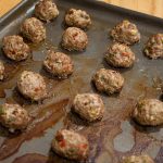 cooked spicy turkey nibbles on a baking sheet