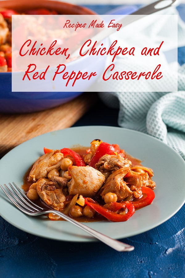 serving of chicken, chickpea and red pepper casserole on a plate with fork