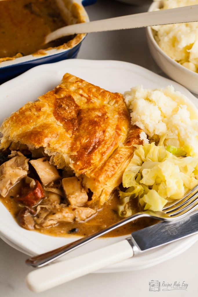 serving of turkey and chorizo pot pie with vegetables.