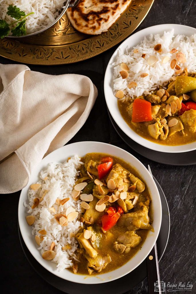 two plates of easy chicken curry.