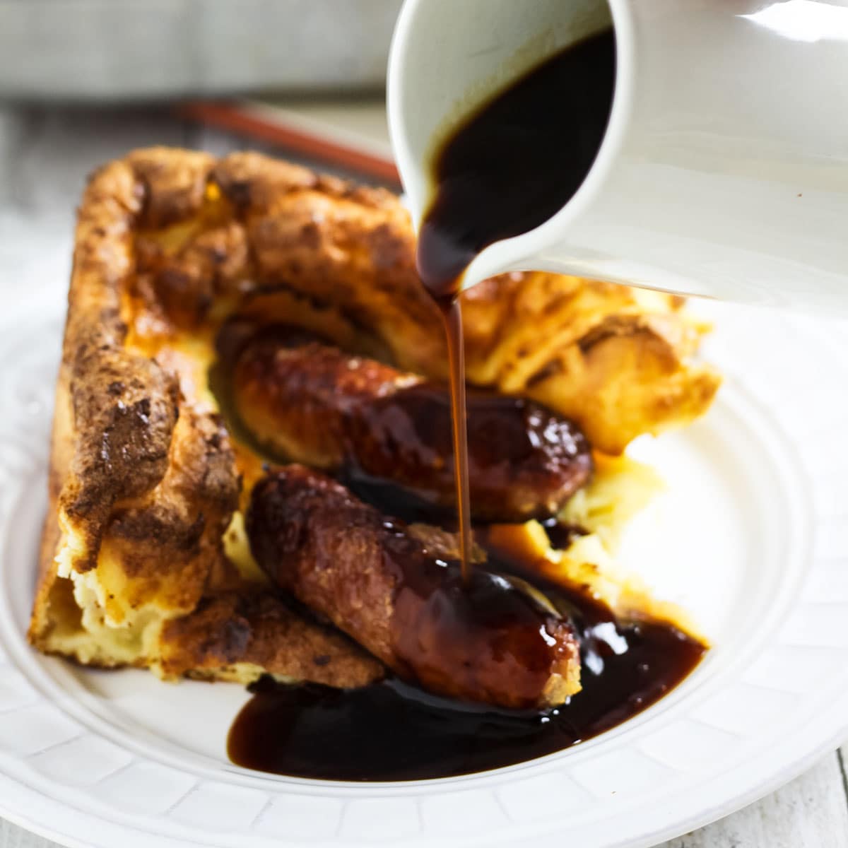 gravy poured onto Toad in the hole.