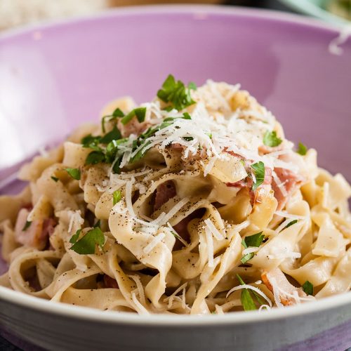 serving of easy cheesy garlic and herb pasta.