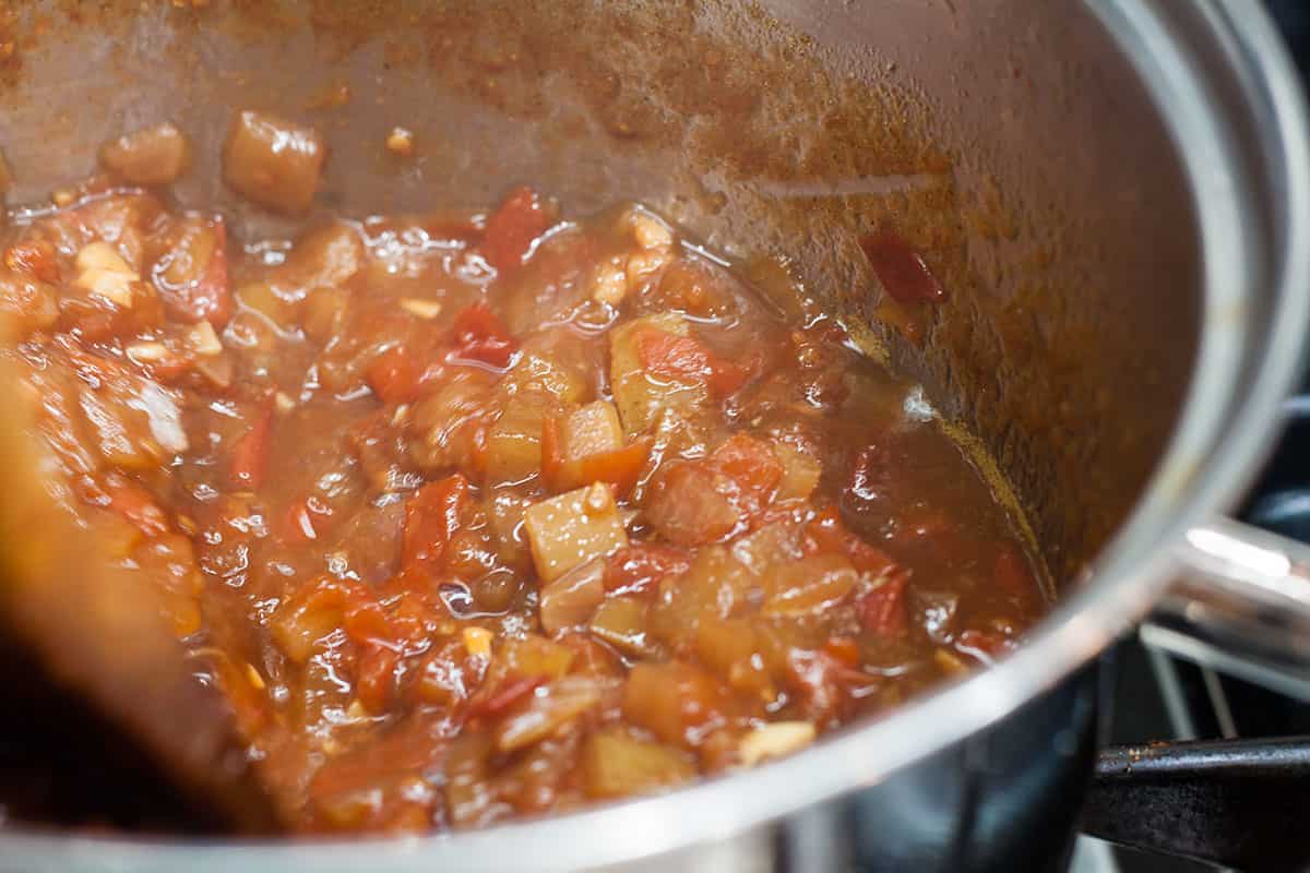 tomato pickle in preserving pan as it starts to thicken