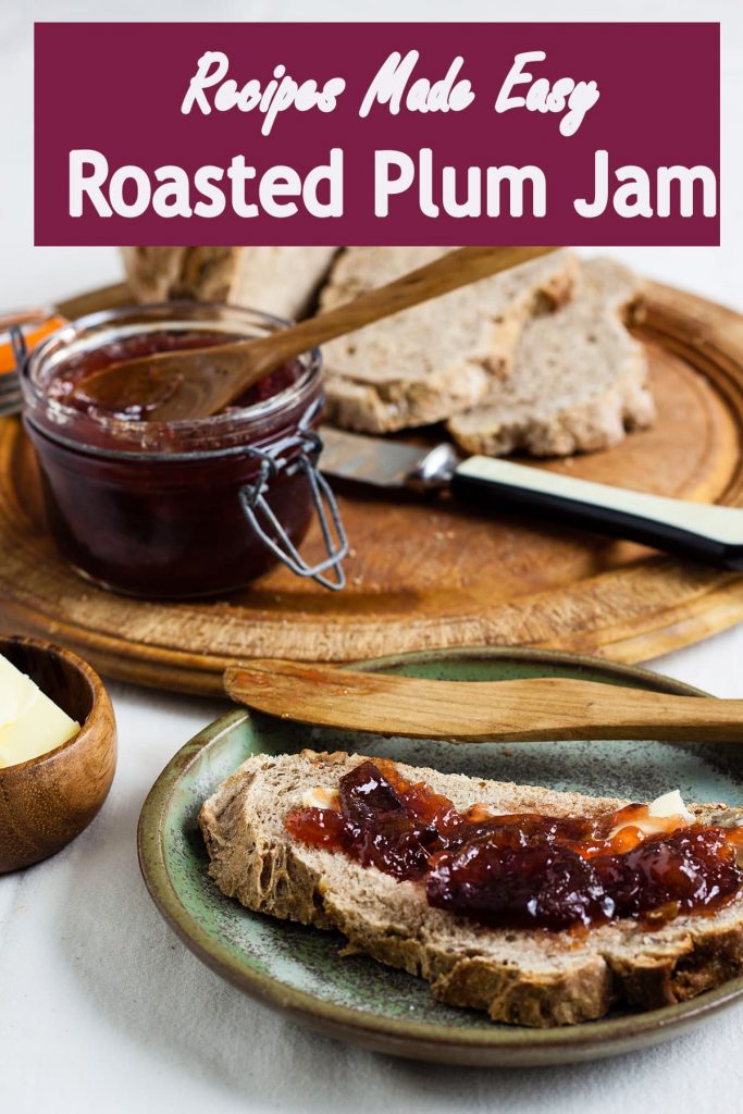 bread spread with plum jam with pot of jam and bread board behind. With text overlay.