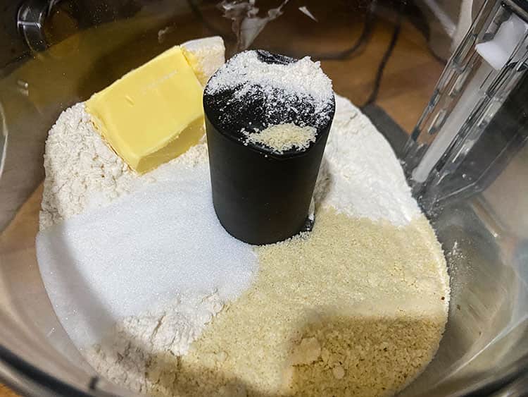crumble ingredients in processor bowl.