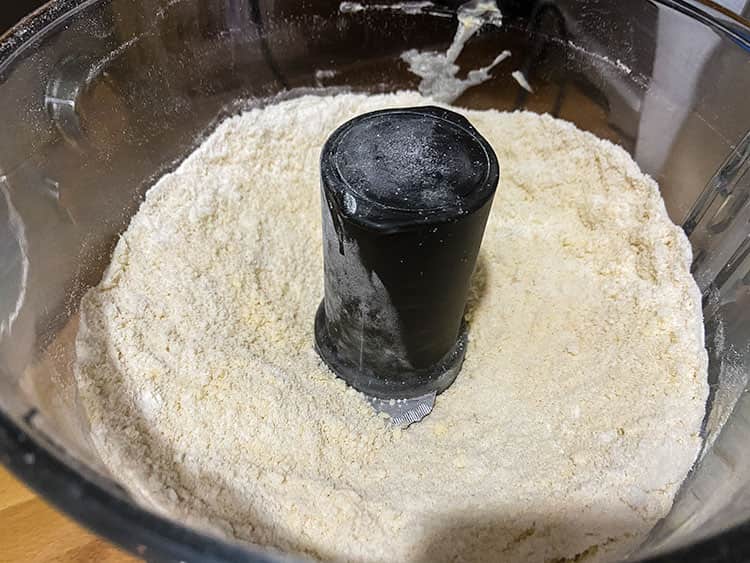 crumble mixture in processor bowl.