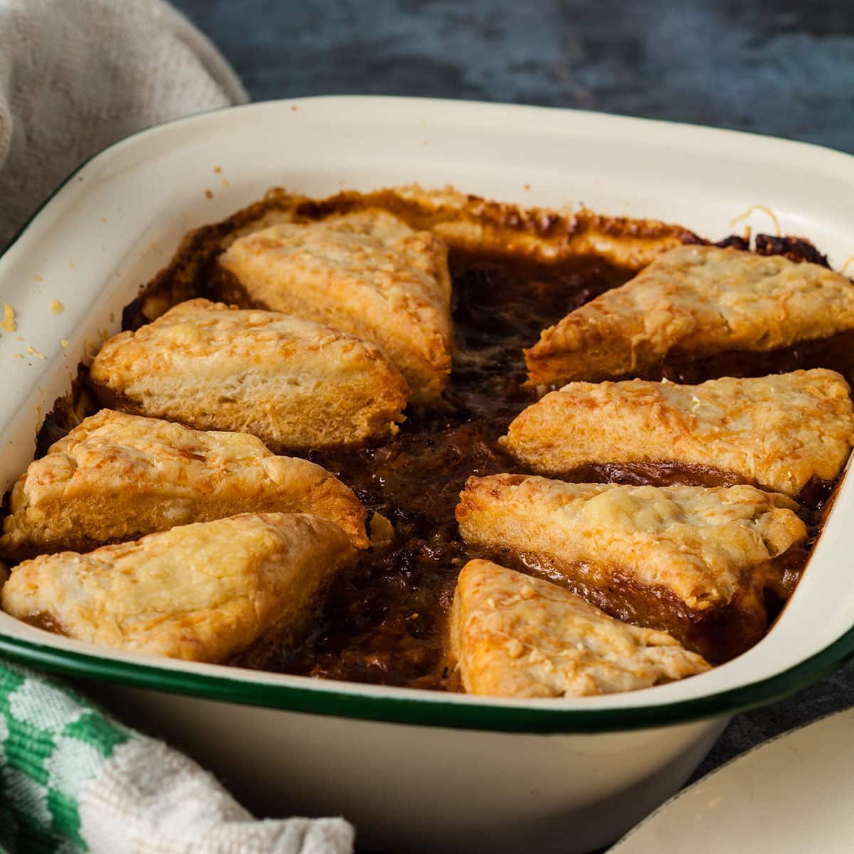savoury mince cobbler in a baking dish.