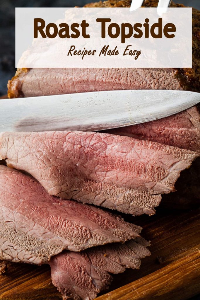 sliced roast topside on a wooden broad.