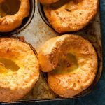 individual yorkshire puddings in the tin.
