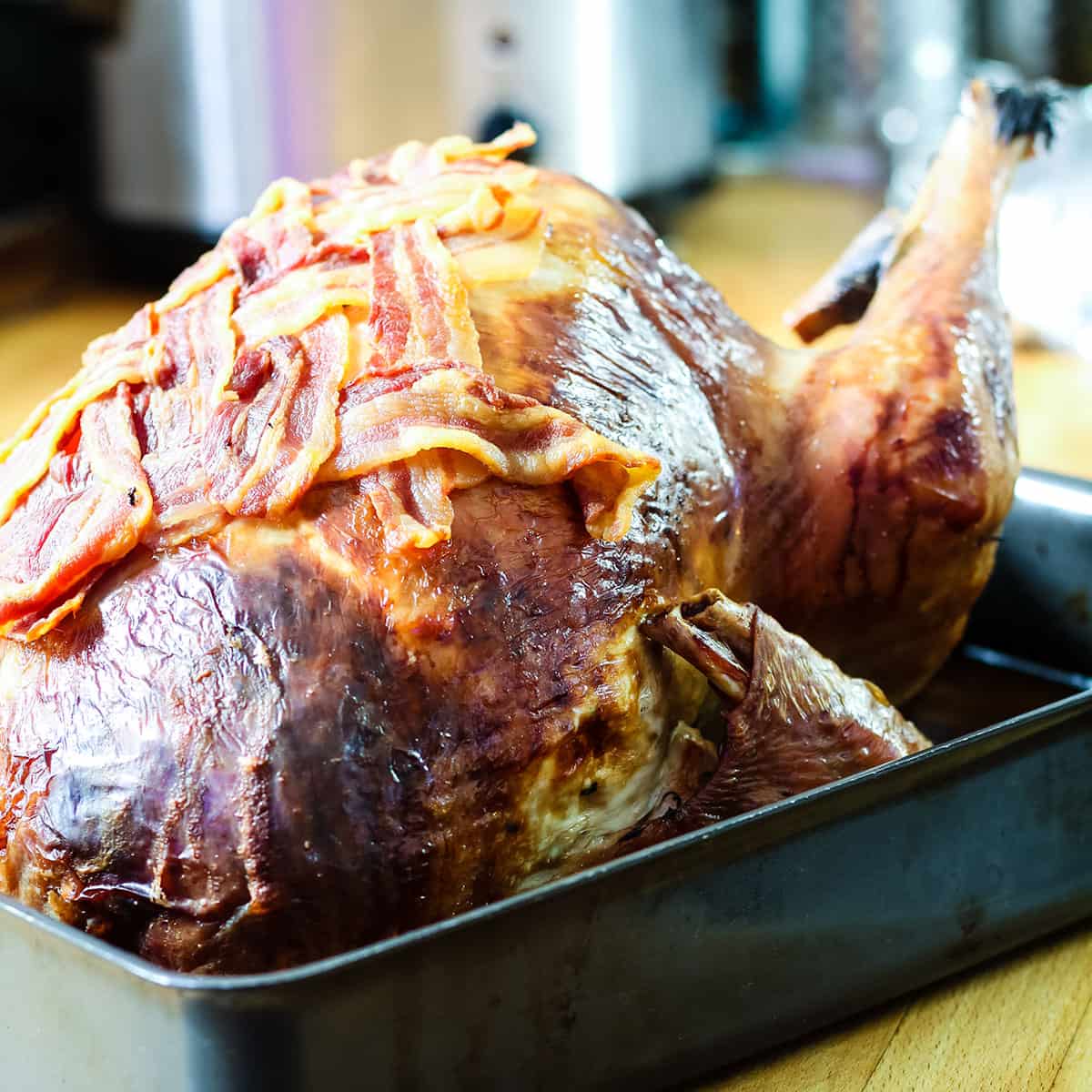 roast turkey in roasting tin.