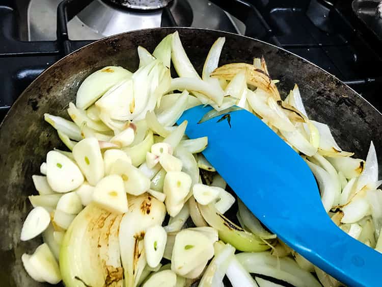 onions and garlic in frying pan.